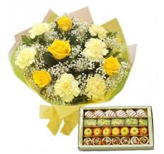 Half Kg Mix Sweets and 10 Yellow Carnation and roses bouquet
