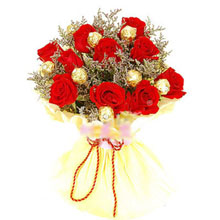 6 Ferrero and 8 red roses in a bouquet
