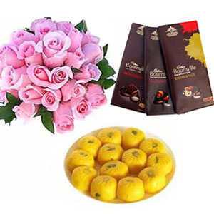 1/2kg kesar peda with 12 pink roses and 3 Bourneville