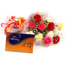 Assorted flowers with chocolate box