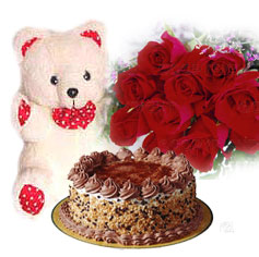 1/2 kg Cake with 12 red roses and teddy