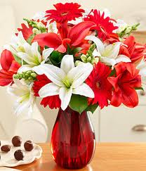 Flowers in a vase with chocolates