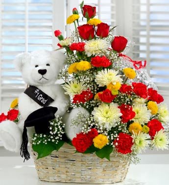 Teddy in Basket with Red and white Flowers
