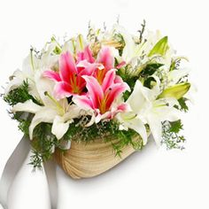 lilies arranged in a basket
