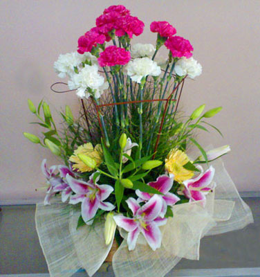 Carnations and Lilies in a basket