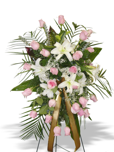 An arrangement with Pink white lilies