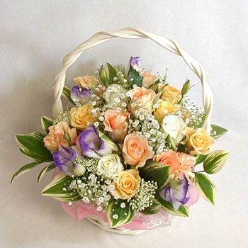 An arrangement of 12 mix roses basket