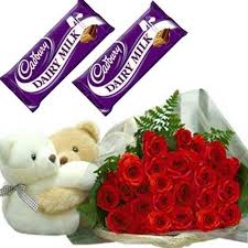 12 red roses 2 teddy bears and 4 silk chocolates