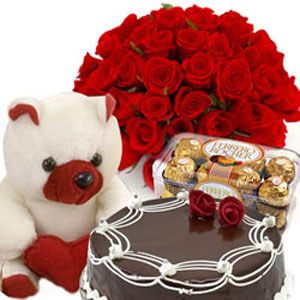 24 Red roses, 6 inch Teddy, 16 chocolates ferrero and 1/2 kg cake
