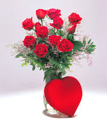 12 red roses in a vase with valentine heart