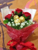 3 Red Roses with 5 ferrero in same bouquet in red wrapping