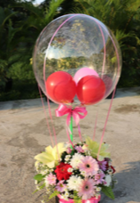 3 air Balloons inside a Transparent balloon with basket of 40 flowers