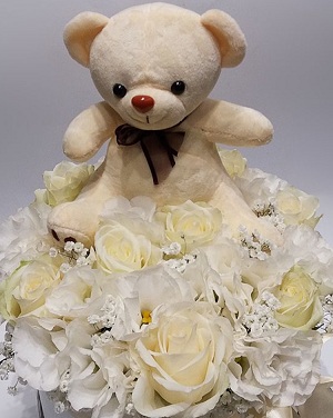 White or cream 6 inch Teddy with bouquet of 20 white roses