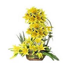 Shades of yellow lilies arrangement