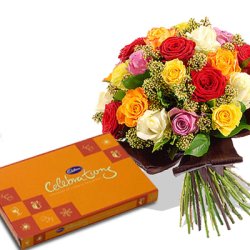 Assorted flowers with chocolate box