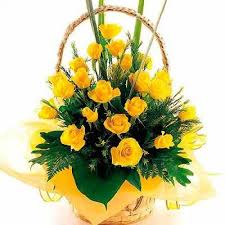 12 yellow roses in a basket