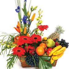 Fresh Fruit and assorted Flowers all in one basket