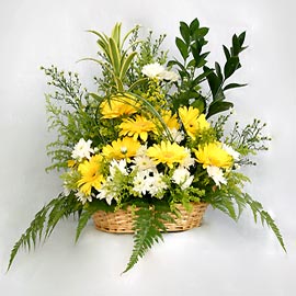 10 yellow gerberas in a basket