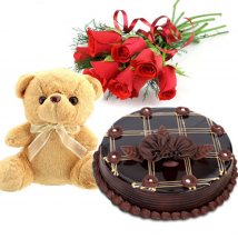 5 Red Roses 1/2 Kg Dark chocolate Cake and Teddy (6 Inches)