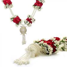 A pair of simple red white rose garland with strings of beads and pearls