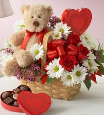Flowers bouquet with teddy and chocolates