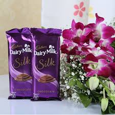 6 Orchids hand bouquet with 2 silk chocolates