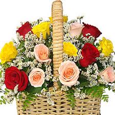 18 Mixed color flowers arrangement in a basket