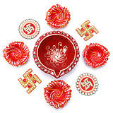 One large diwali diya with 4 small diyas