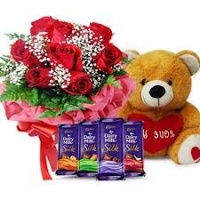 Arrangement of 12 roses basket 4 silk chocolates with teddy