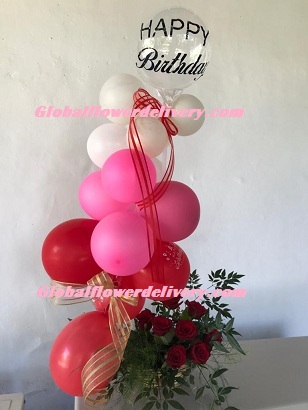 Pink red white air balloons arrangement with roses and happy birthday balloon