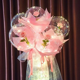 Luminous 5 pink roses inside 3 transparent balloon with White and pink Wrapping