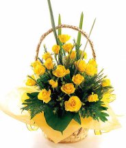 12 yellow roses in a basket