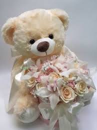 White or cream 6 inch Teddy with bouquet of 20 white roses