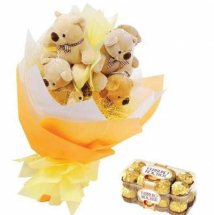 16 Ferrero rocher Chocolates and 4 Teddy bears in Bouquet