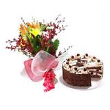 1/2 kg cake and flowers bouquet