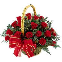 12 red roses in a basket